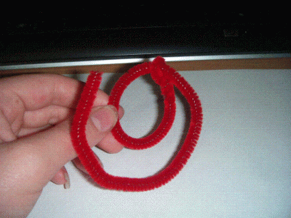 4 - Bend the end around again until it is about the size of their waist